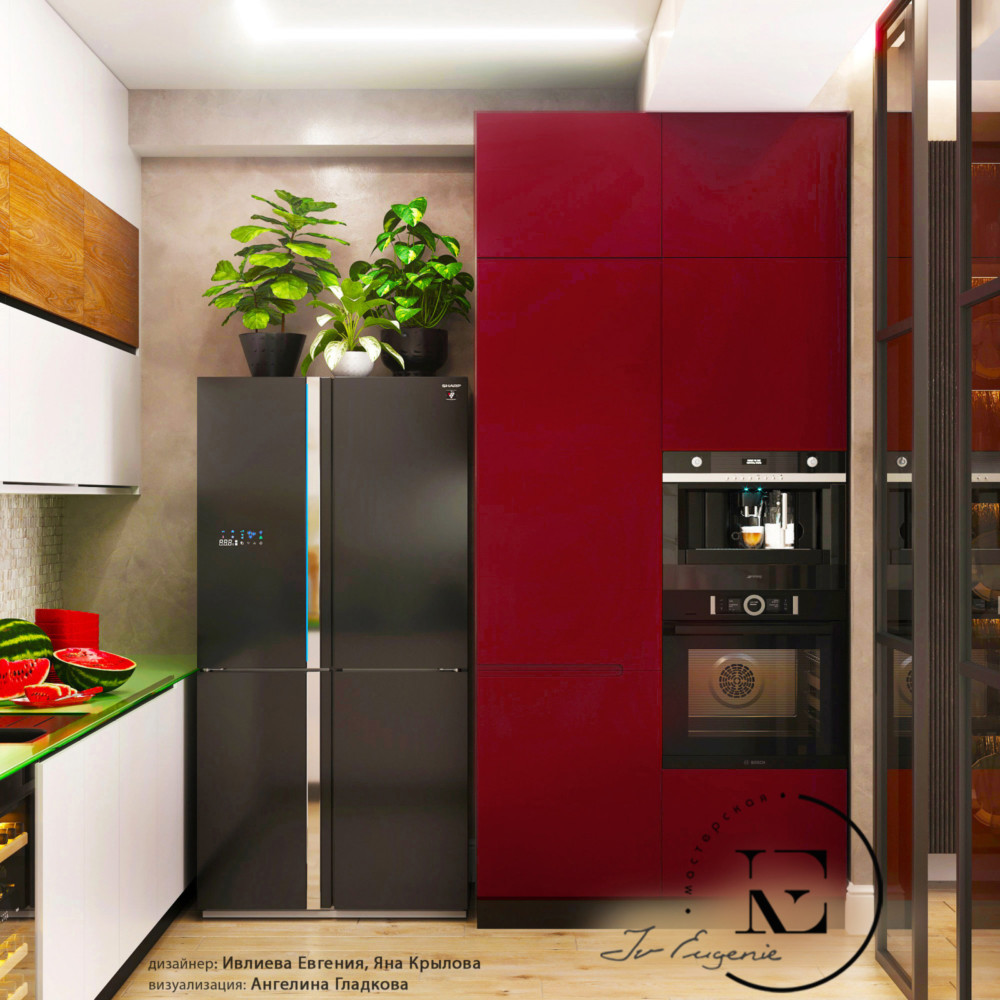 Шкаф, цвета сочной вишни, для встроенной бытовой техники  поддерживает общую стилистику помещения. Темный холодильник хорошо гармонирует с таким же по цвету профилем раздвижных перегородок.